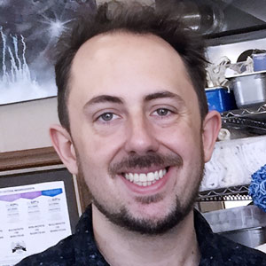 Roe Pressley - Vice President and Lead SEO/Content Writer at DocuCopies.com - Author Profile Headshot